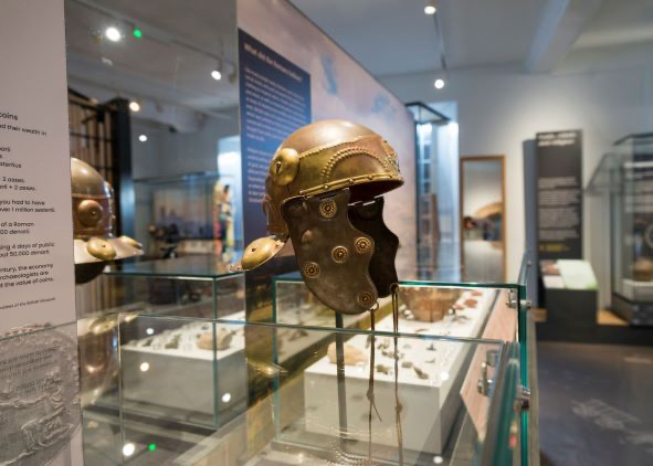Explore East Cambs - image of Roman style helmet on display at Ely Museum